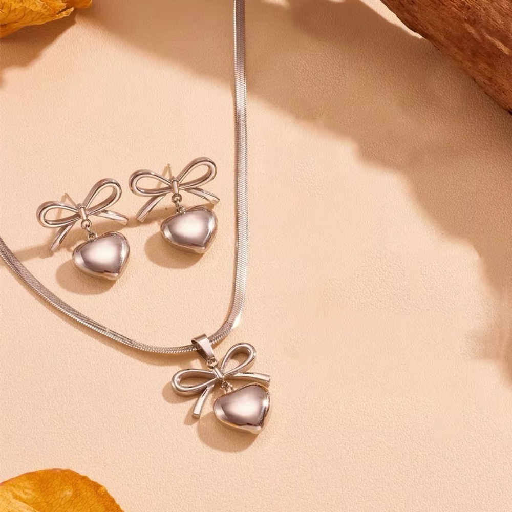 Elegant Silver Bow Jewelry Set, Stainless Steel .